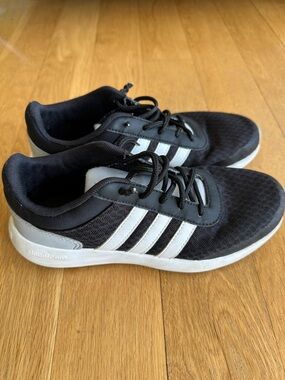 adidas Women’s Black Sneakers with White Stripes